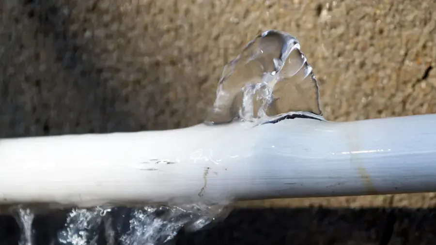 Frozen supply pipe split open and leaking during a Michigan deep freeze