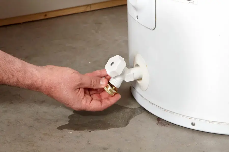 Water heater leaking onto a basement floor in Rochester, MI